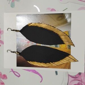 LEATHER FRINGE EARRINGS